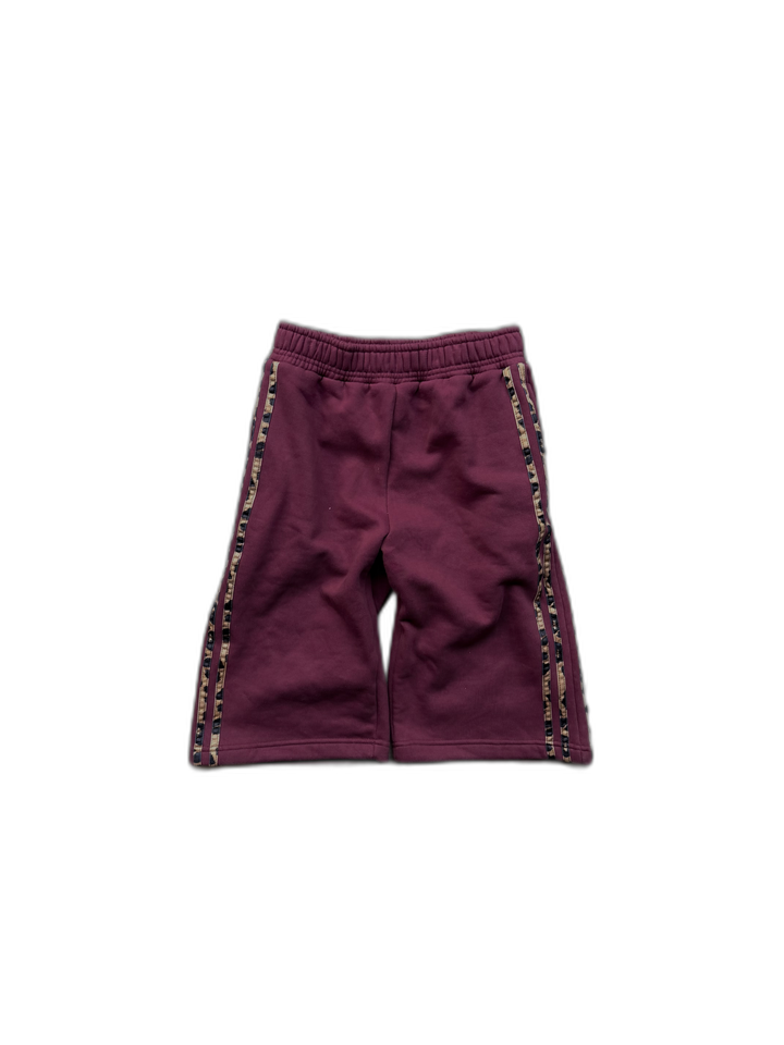 Maroon Noire shorts with cheetah-trim side stripes