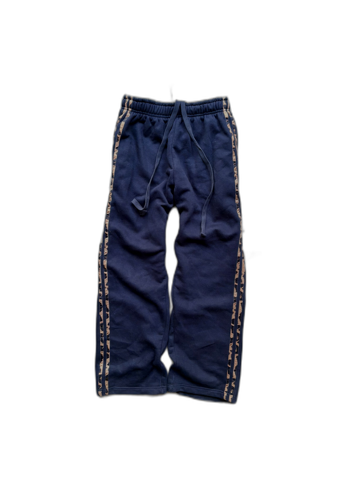 Navy Noire sweats with cheetah-trim side stripes